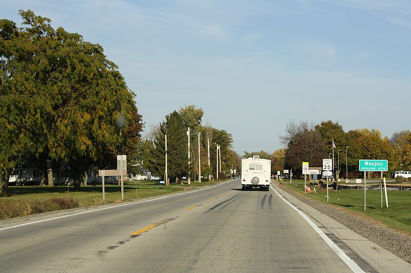 File:WaupunWisconsinSignWIS68.jpg