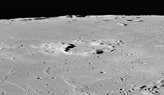 Oblique view of Wolf from Apollo 16, facing south Wolf crater AS16-M-2489.jpg