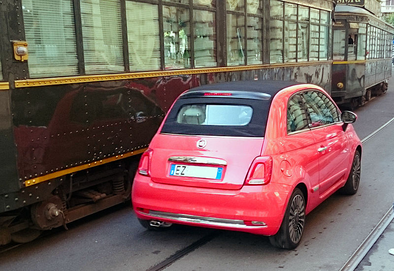 File:" 15 - ITAlian red convertible - Fiat 500 C (2015) in Milan whit tram ATM (restaurant vehicle).jpg