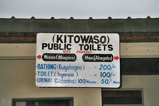 Sign in Kisoro with prices in Ugandan shillings; note the use of the '/=' notation.