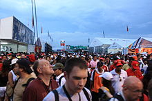 Crowd members leaving the stands after the race was abandoned. 2009 Malaysian Grand Prix disgruntled fans.jpg