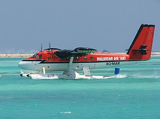 A Maldivian Air Taxi. An air taxi is a small commercial aircraft that makes short flights on demand.