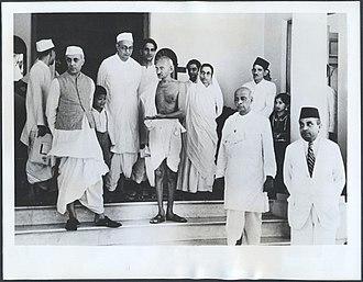 Gandhi, Jawaharlal Nehru, Vallabhbhai Patel and fellow nationalist leaders can be seen wearing dhoti A news photo from 1939, showing Nehru, Gandhi, and Sardar Vallabhbhai Patel (to the right, in the foreground, wearing the dhoti) in Bombay.jpg