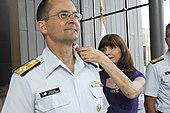 Adm. Charles D. Michel, Coast Guard vice commandant, is pinned with his new rank by his wife Claudia on 1 June 2016. Adm. Charles Michel promotion ceremony 160601-G-KJ067-274.jpg