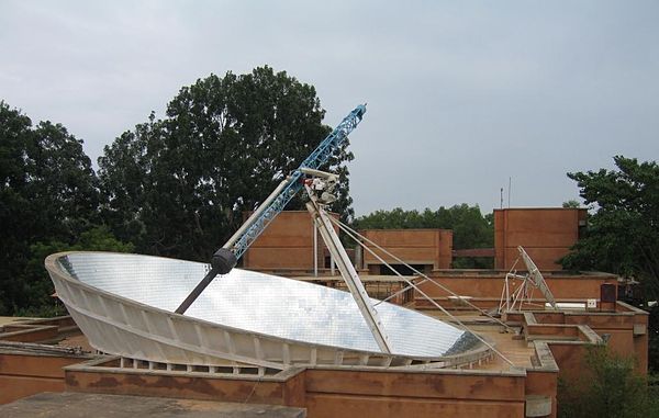 Parabolic dish produces steam for cooking, in Auroville, India.