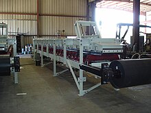 Custom made belt feeder to be used in a material handling capacity. Belt feeder.jpg