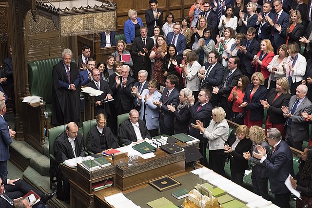 Opposition MPs applaud Bercow as he sets the date for his retirement.