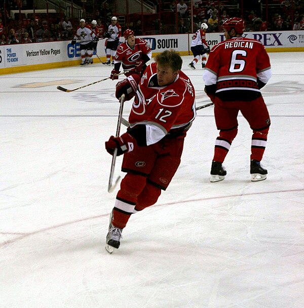 Hedican (back) and Eric Staal with the Carolina Hurricanes in 2008