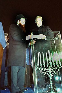 President Carter helps light the first National Menorah in 1979. Carter Menorah.jpg