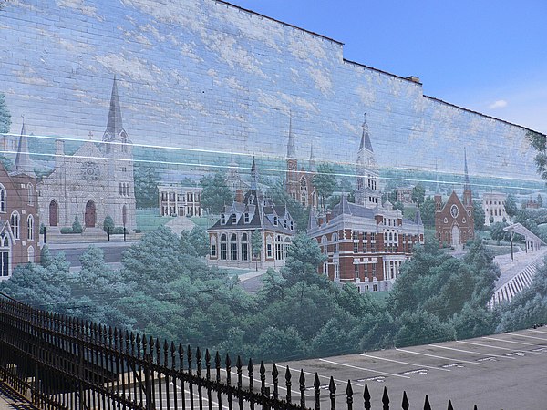 Mural painted on the only remaining wall of a building destroyed by the '99 tornado.