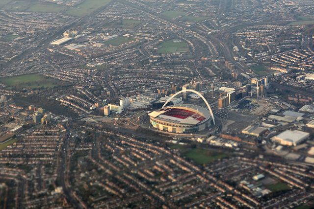 An aerial view of Wembley, showing part of High Road, the industrial estate, Wembley Arena and Wembley Stadium