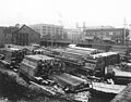 Construction of Great Northern Railroad tunnel beneath downtown Seattle showing the material yard at south end, site of King (CURTIS 2092).jpeg