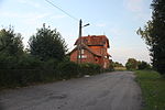 English: Old railway station in Dźwierzuty. Polski: Dawny dworzec kolejowy we wsi Dźwierzuty.