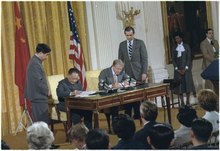 Chinese Vice Premier Deng Xiaoping and US President Jimmy Carter during the former's visit to the US, when the second communique was released. Deng Xiaoping and Jimmy Carter during the Sino-American signing ceremony. - NARA - 183300.tif