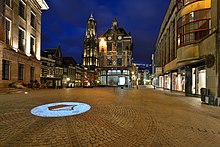 The Dom Tower seen from Downtown Utrecht. The remaining section of the Cathedral of Saint Martin is not connected to the tower since the collapse of the nave in 1674 due to a storm.