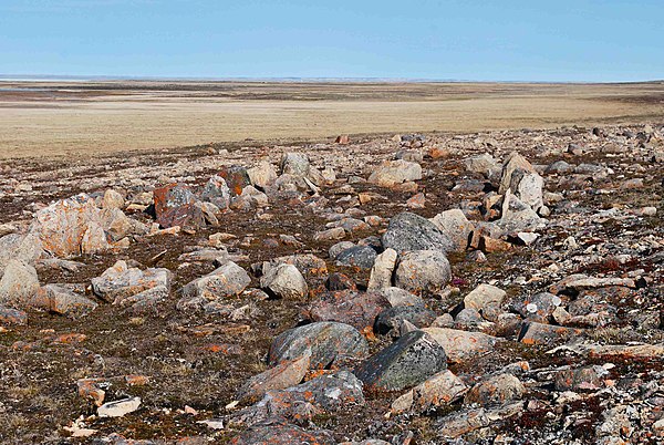 Stone remains of a Dorset culture longhouse near Cambridge Bay, Nunavut