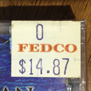 A Fedco price tag marking a compact disc