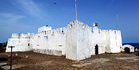 Exterior photograph of Fort Metal Cross, Dixcove, Western Region, Ghana. It is composed of two images stitched together taken from just outside the fort in May, 2012. Fotograf: Thegoodeastern