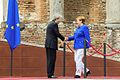 G7 Taormina Paolo Gentiloni Angela Merkel handshake 2017-05-26.jpg
