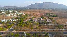 Aerial view of GMKMC with surrounding Mountains and greenery Gmkmc-aerial-view.jpg