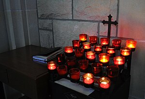 A votive candle rack at Grace Episcopal Cathedral, an Anglican Christian cathedral in Topeka Grace Cathedral - Votive Rack.jpg