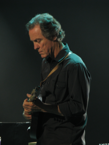 Leisz playing mandolin in Eric Clapton's band