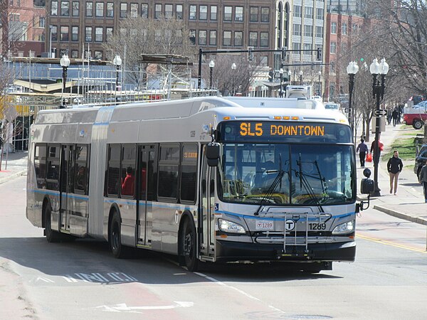 A New Flyer XDE60 Xcelsior articulated hybrid-electric bus operated by MBTA