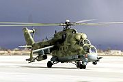 A Russian Mi-24P Hind-F large helicopter gunship and low-capacity troop transport at Naval Air Station Fallon at Fallon, Nevada (2000).