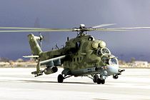 A Russian Mi-24P Hind-F large helicopter gunship and low-capacity troop transport.