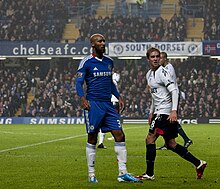 Holden and Nicolas Anelka during a match in the Premier League Nicolas Anelka Stuart Holden - Chelsea vs Bolton Wanderers 2.jpg