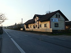 Road I/16 and house no. 23 in Ohaveč