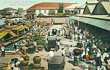 A postcard of Quinta Market in 1911, showing the rear of the market facing the Pasig River from the Puente Colgante Quinta Market from the Puente Colgante.jpg