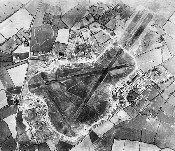Aerial photograph of RAF Exeter, 20 March 1944. The long runway is 08/26, the other two being 02/20 and 13/31. The latter two were closed at undisclos