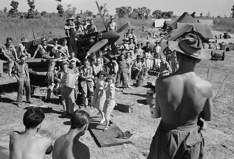 File:RAF personnel watch Carolyn Wright and Roberta Robertson tap-dancing during an impromptu ENSA (Entertainments National Service Association) show at an airfield in Burma, February 1945. CI1053.jpg