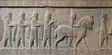 Saka Tigraxauda tribute bearers to the Achaemenid Empire, Apadana, Staircase 12. Saka tribute-bearers, Apadana staircase 12.jpg