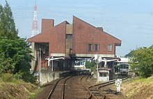 Shin-Moriya Station tracks building train 2016 10 16.JPG