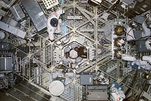 Astronauts Edward Gibson and Gerald Carr during the Skylab 4 mission. Skylab looking down.jpg