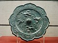 Tang Dynasty bronze mirror with relief decoration.JPG