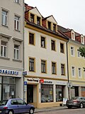 Residential house in closed development, with side wing to the courtyard and rear houses