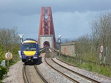 Northbound Class 170 approaching the Forth Bridge on the Edinburgh to Aberdeen Line Train approaching the Forth Bridge.JPG