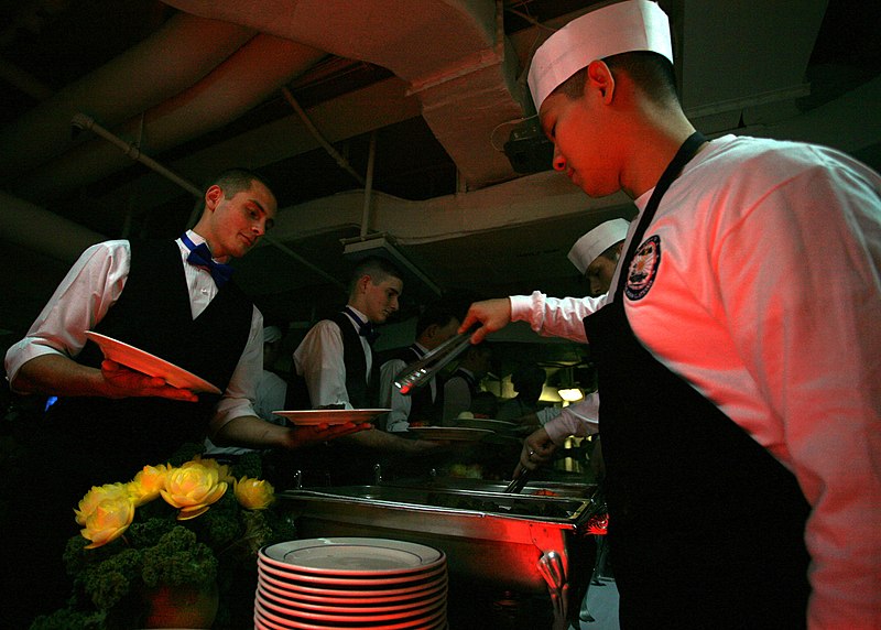 File:US Navy 061016-N-6364G-038 U.S. Navy Culinary Specialist 2nd Class Jimmy Chaung, right, serves steak during the birthday meal held on the mess decks aboard the Nimitz-Class aircraft carrier USS John C. Stennis (CVN 74).jpg