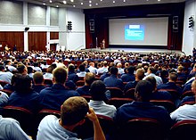 The "psychic staring effect" has been reported in crowded classrooms and lectures US Navy 070117-N-3228J-005 Sailors assigned to submarine tender USS Frank Cable (AS 40) listen to one of a series of lectures on safety and Operational Risk Management at the Naval Base Guam base theater.jpg