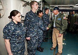 US Navy 120121-N-FI736-127 Secretary of Defense (SECDEF) Leon Panetta greets Sailors upon arrival aboard the aircraft carrier USS Enterprise (CVN 6.jpg