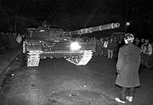 Unarmed Lithuanian citizen standing against a Soviet tank during the January Events Unarmed Lithuanian citizen standing against Soviet tank, Vilnius, January 13, 1991.jpg
