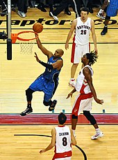 Carter with the Magic performs a layup against the Raptors, November 2009