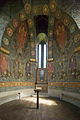 Chapel showing 1 of 4 embrasures, 2 of 4 seraphs, 6 of 24 angels (half face you and half face away) and the medallions. At front is the altar