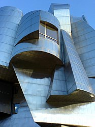 A closeup of the Frank Gehry-designed building