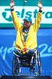 141100 - Wheelchair tennis David Hall podium medal - 3b - 2000 Sydney ceremony photo.jpg