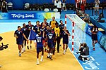 L'équipe de France de handball célébrant sa victoire dans le tournoi olympique de Pékin.