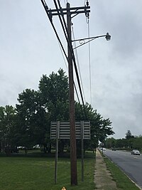 2016-05-18 08 18 22 Old-style street light support along Hollywood Road (Maryland State Route 245) near Point Lookout Road (Maryland State Route 5) in Leonardtown, St. Mary's County, Maryland.jpg